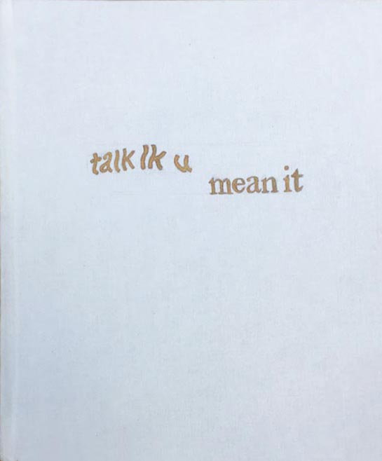 talk lk u mean it cover, solid white cloth with centered title in gold capcha-style