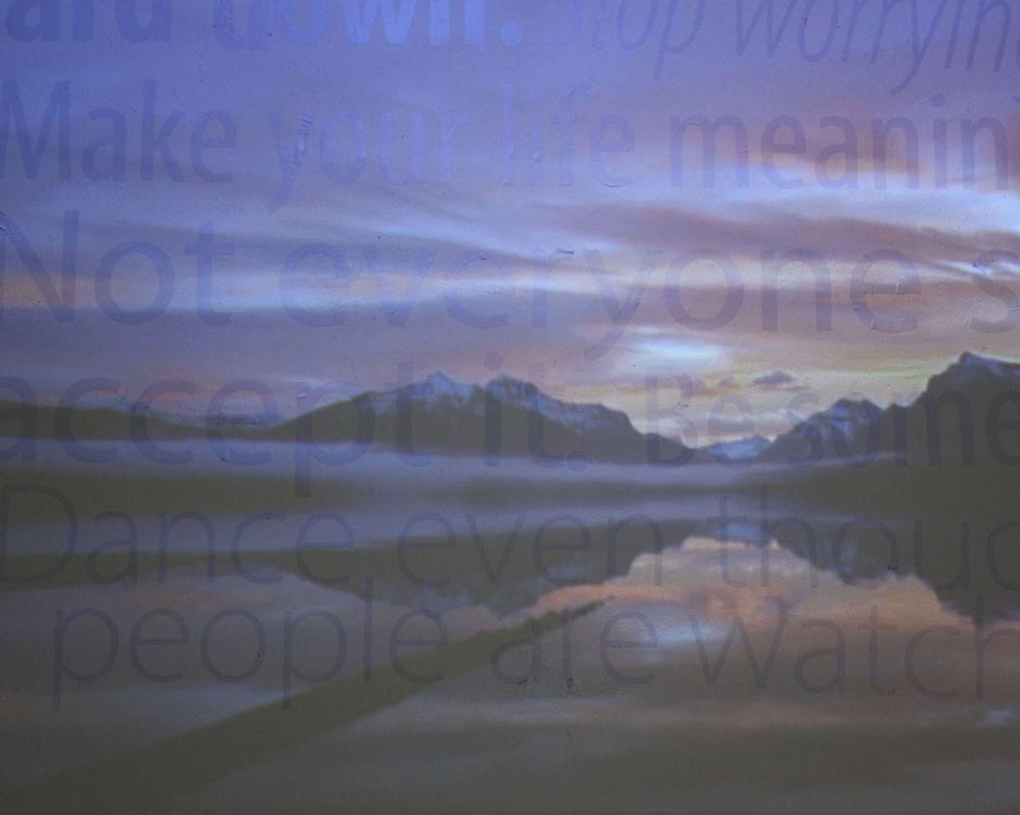 closeup of projected sunset on vinyl type on wall